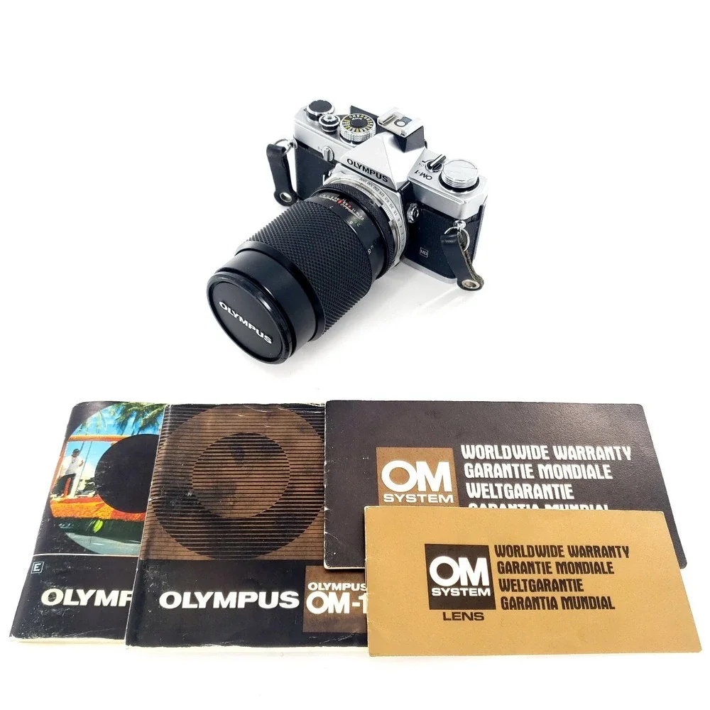 Olympus OM 1 35mm SLR Film Camera with 75-150mm Lens w/ Quantaray 135mm f/2.8